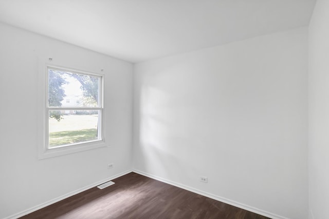 4018 Oxford Ct, Streamwood, IL 60107 - spare room with dark wood-type flooring and baseboards