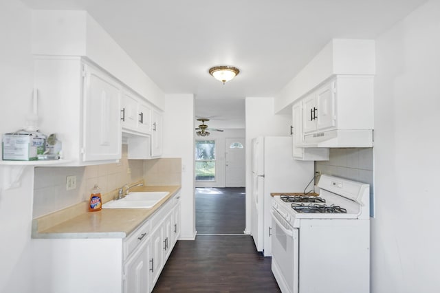 4018 Oxford Ct, Streamwood, IL 60107 - kitchen with white gas range oven, a ceiling fan, under cabinet range hood, dark wood finished floors, and light countertops