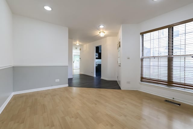 1521 Whitman Ct, Schaumburg, IL 60173 - unfurnished room with wood finished floors and recessed lighting