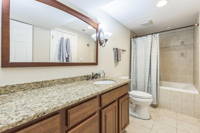 5609 N Mango Ave Unit 1W, Chicago, IL 60646 - bathroom featuring tile patterned floors, vanity, recessed lighting, and tiled shower / bath combo