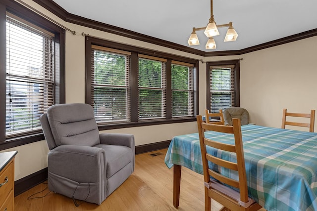 5609 N Mango Ave Unit 1W, Chicago, IL 60646 - bedroom with light wood-type flooring and crown molding