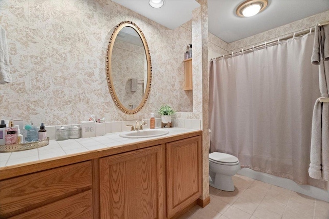 344 Prairie Ave, Winthrop Harbor, IL 60096 - bathroom with wallpapered walls, vanity, tile patterned floors, and shower / bath combo