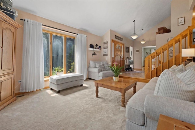 344 Prairie Ave, Winthrop Harbor, IL 60096 - living area featuring light colored carpet, stairway, and high vaulted ceiling
