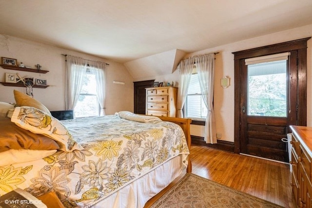 11610 2nd St, Huntley, IL 60142 - bedroom with wood finished floors and lofted ceiling