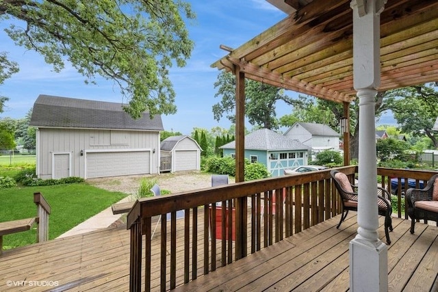 11610 2nd St, Huntley, IL 60142 - wooden terrace with an outbuilding, a garage, and a yard