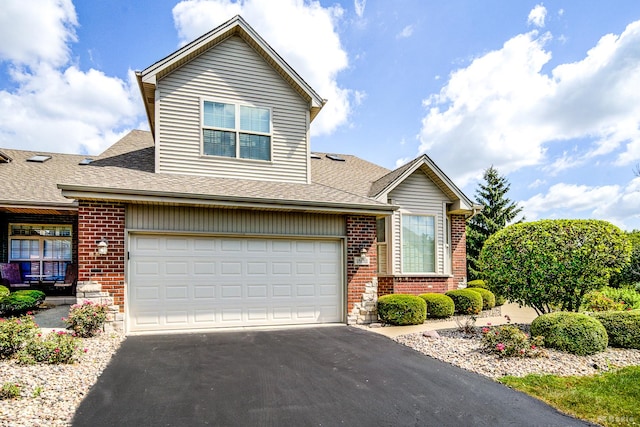 18011 Breckenridge Blvd, Orland Park, IL 60467 - traditional home with brick siding, driveway, a shingled roof, and an attached garage