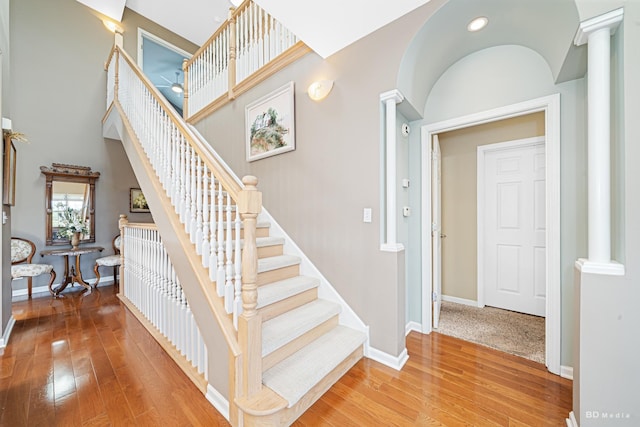 18011 Breckenridge Blvd, Orland Park, IL 60467 - stairway with ornate columns, hardwood / wood-style flooring, and recessed lighting