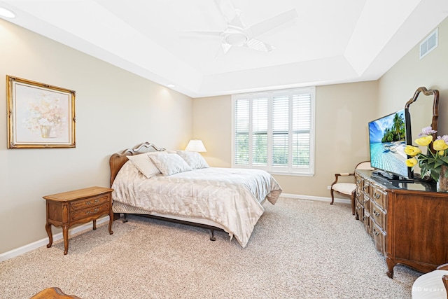 18011 Breckenridge Blvd, Orland Park, IL 60467 - bedroom featuring light colored carpet, a tray ceiling, and a ceiling fan