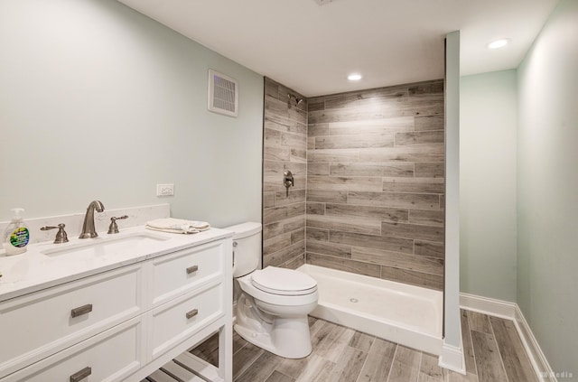 18011 Breckenridge Blvd, Orland Park, IL 60467 - full bath with wood finished floors, tiled shower, vanity, and recessed lighting
