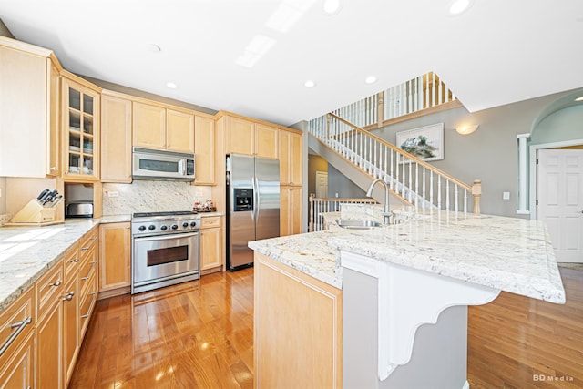 18011 Breckenridge Blvd, Orland Park, IL 60467 - kitchen with appliances with stainless steel finishes, light wood-style flooring, light brown cabinets, tasteful backsplash, and recessed lighting
