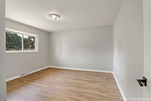 2029 Gabriel Ave, Zion, IL 60099 - empty room featuring light wood-type flooring and baseboards