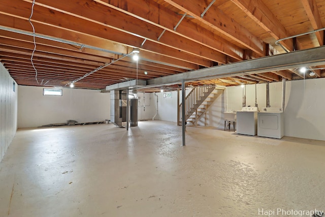 2029 Gabriel Ave, Zion, IL 60099 - basement featuring washer and clothes dryer, water heater, and stairway