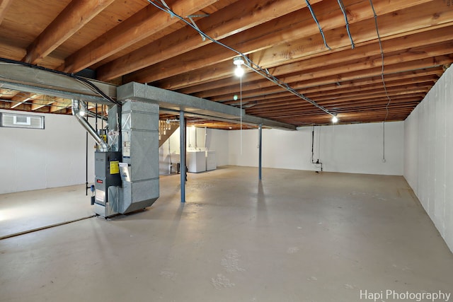 2029 Gabriel Ave, Zion, IL 60099 - basement with heating unit and washing machine and clothes dryer