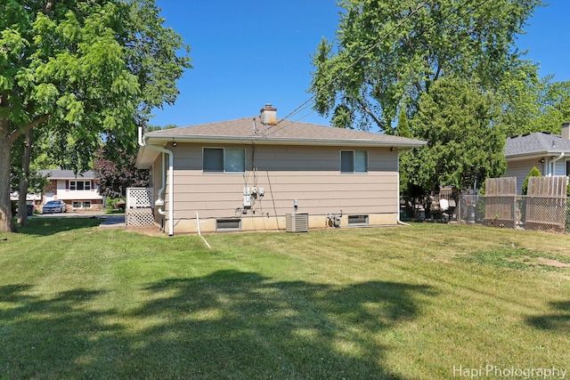 2029 Gabriel Ave, Zion, IL 60099 - rear view of property featuring a chimney and a shingled roof