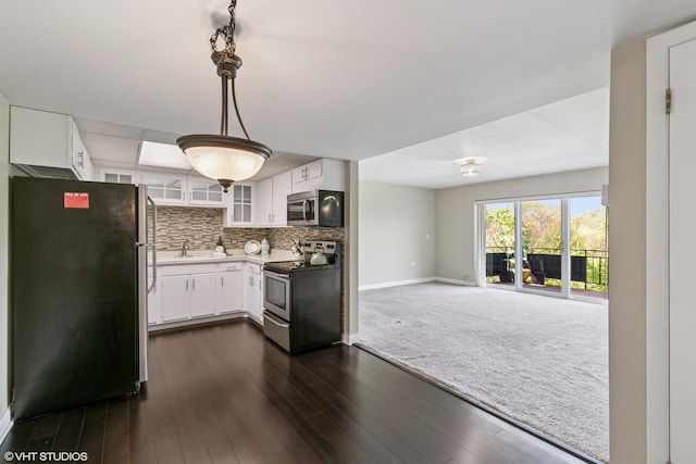 940 Holbrook Rd Unit 34C, Homewood, IL 60430 - kitchen with stainless steel appliances, open floor plan, glass insert cabinets, tasteful backsplash, and white cabinetry