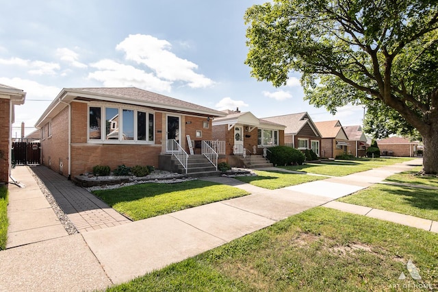 5831 S Meade Ave, Chicago, IL 60638 - bungalow with brick siding and a front lawn