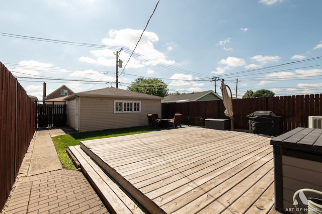 5831 S Meade Ave, Chicago, IL 60638 - wooden deck with a grill, a fenced backyard, and an outbuilding