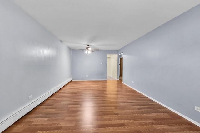 120A Collen Dr Unit 105, Lombard, IL 60148 - empty room with baseboard heating, a ceiling fan, and wood finished floors