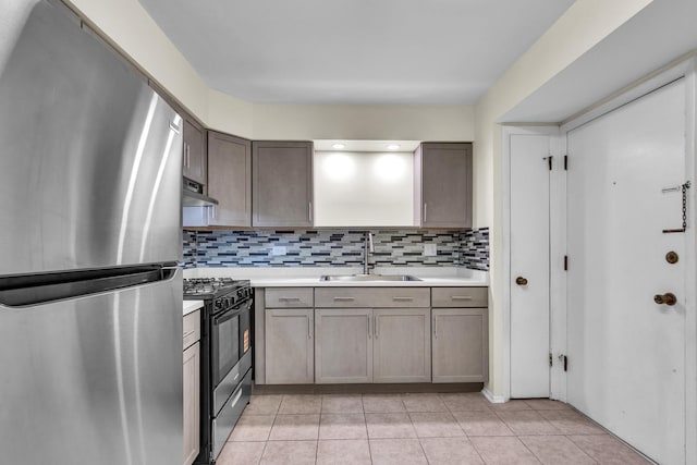 120A Collen Dr Unit 105, Lombard, IL 60148 - kitchen with freestanding refrigerator, black gas range, light countertops, and decorative backsplash
