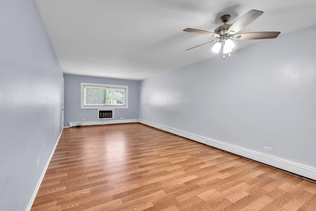 120A Collen Dr Unit 105, Lombard, IL 60148 - empty room with a baseboard radiator, ceiling fan, and wood finished floors