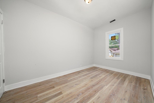 14137 Greenwood Rd, Dolton, IL 60419 - spare room featuring light wood finished floors and baseboards
