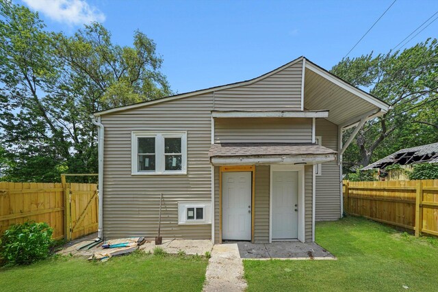 14137 Greenwood Rd, Dolton, IL 60419 - back of house featuring a fenced backyard and a gate