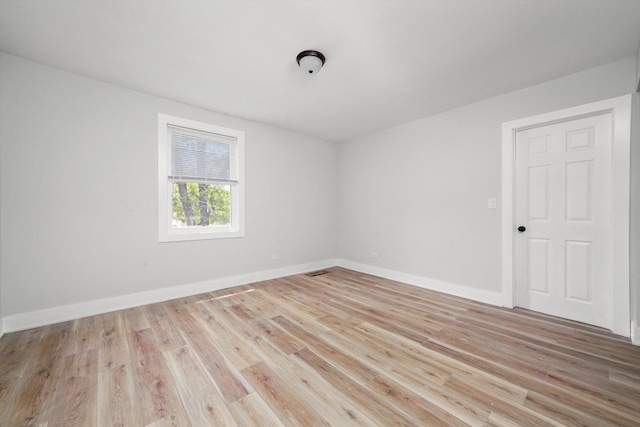 14137 Greenwood Rd, Dolton, IL 60419 - empty room with light wood-type flooring