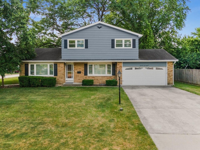 308 Long Ave, North Aurora, IL 60542 - traditional-style house featuring brick siding, concrete driveway, a garage, and roof with shingles