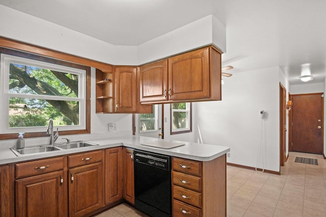 308 Long Ave, North Aurora, IL 60542 - kitchen with dishwasher, a peninsula, and brown cabinets