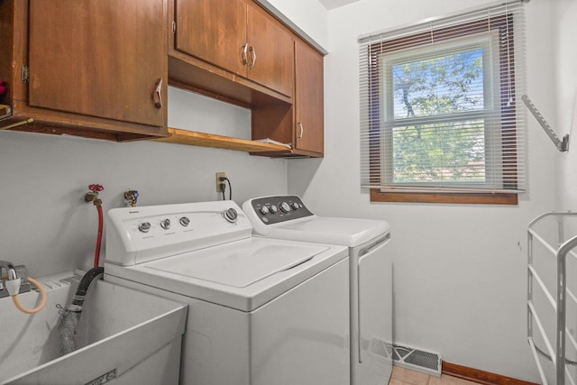308 Long Ave, North Aurora, IL 60542 - laundry room with cabinet space and separate washer and dryer