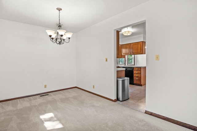 308 Long Ave, North Aurora, IL 60542 - unfurnished dining area featuring light colored carpet and a chandelier