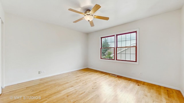 1828 Wicker St, Woodstock, IL 60098 - spare room featuring wood-type flooring and a ceiling fan