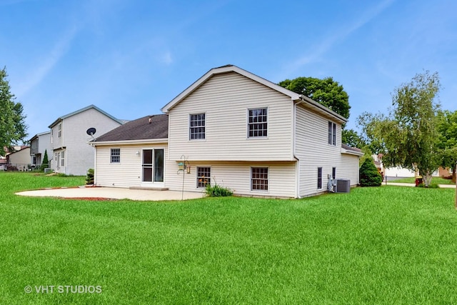 1828 Wicker St, Woodstock, IL 60098 - back of property with a patio area and a lawn