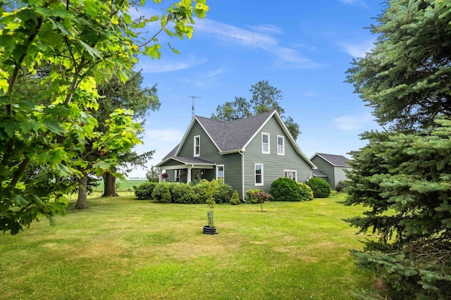 28231 US Highway 150, Leroy, IL 61752 - view of front of house featuring a front lawn and a shingled roof