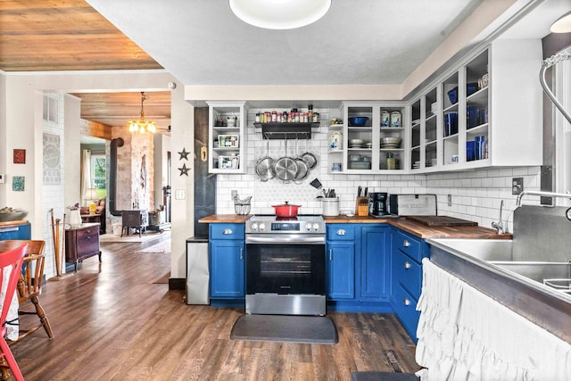 28231 US Highway 150, Leroy, IL 61752 - kitchen with blue cabinetry, wood counters, stainless steel range with electric stovetop, open shelves, and dark wood-type flooring
