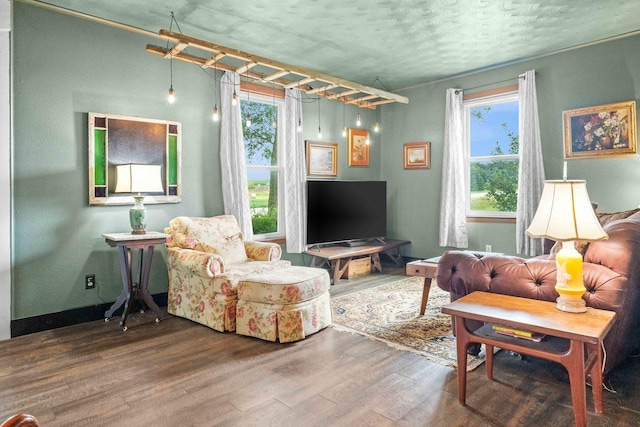 28231 US Highway 150, Leroy, IL 61752 - living room with wood finished floors, healthy amount of natural light, and a textured ceiling