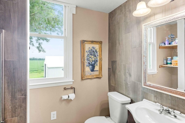 28231 US Highway 150, Leroy, IL 61752 - bathroom featuring toilet and tile walls