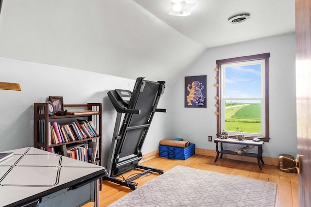 28231 US Highway 150, Leroy, IL 61752 - exercise room featuring lofted ceiling and wood finished floors