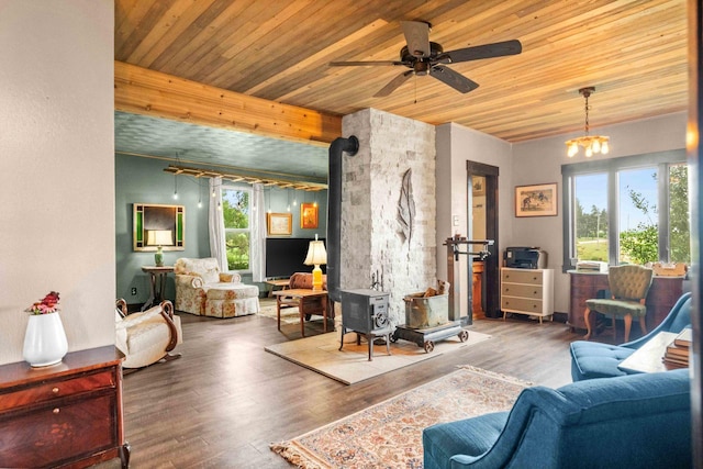 28231 US Highway 150, Leroy, IL 61752 - living area with a wood stove, wooden ceiling, wood finished floors, and ceiling fan
