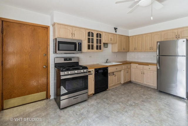 837 N Harlem Ave Unit 2N, Oak Park, IL 60302 - kitchen with stainless steel appliances, light brown cabinetry, light flooring, glass insert cabinets, and decorative backsplash