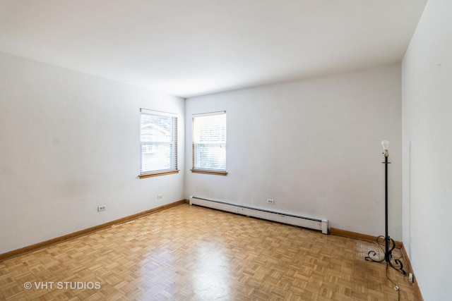 837 N Harlem Ave Unit 2N, Oak Park, IL 60302 - spare room with baseboard heating and baseboards
