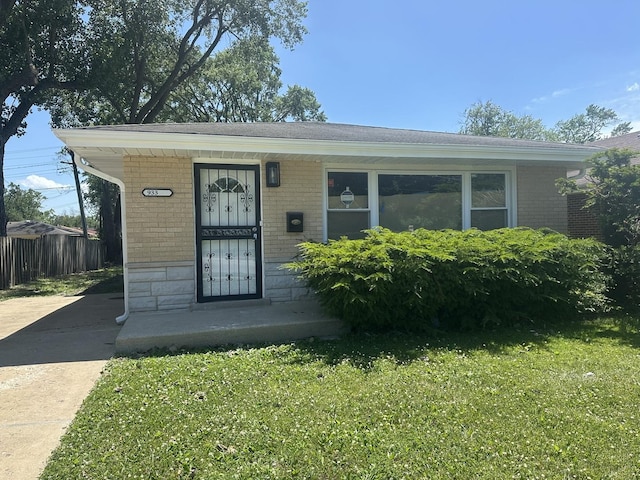 933 E 142nd St, Dolton, IL 60419 - view of front of house featuring brick siding