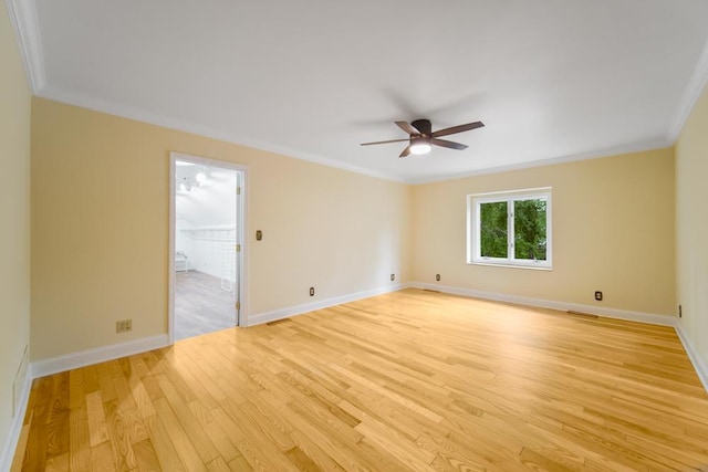 1234 Will Dr, Lockport, IL 60441 - unfurnished room with a ceiling fan, light wood finished floors, and ornamental molding