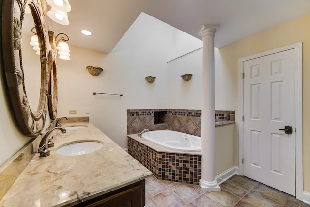 1234 Will Dr, Lockport, IL 60441 - bathroom featuring a garden tub, double vanity, and decorative columns