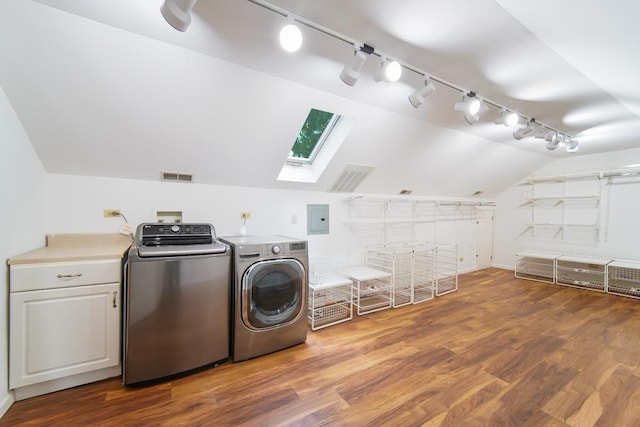 1234 Will Dr, Lockport, IL 60441 - laundry area with track lighting, washing machine and dryer, a skylight, cabinet space, and electric panel