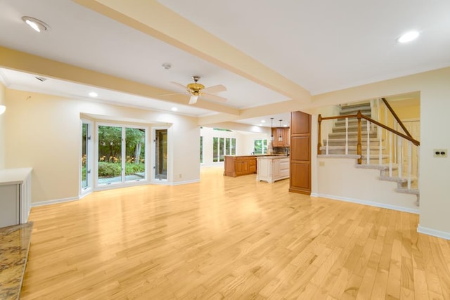 1234 Will Dr, Lockport, IL 60441 - unfurnished living room with light wood-style flooring, a ceiling fan, stairway, and recessed lighting