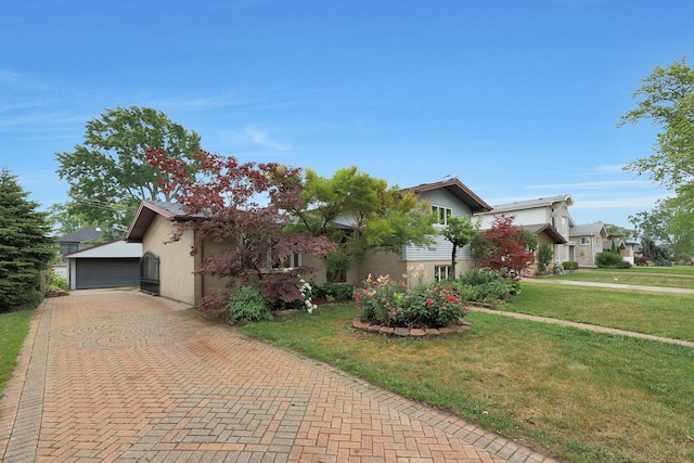 9043 Oriole Ave, Morton Grove, IL 60053 - split level home with a front yard and brick siding