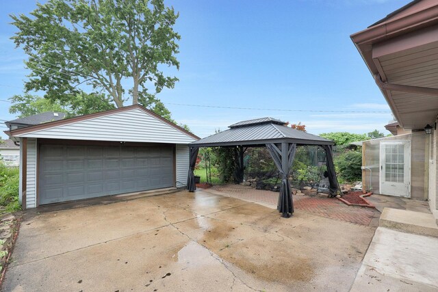 9043 Oriole Ave, Morton Grove, IL 60053 - view of patio with a garage