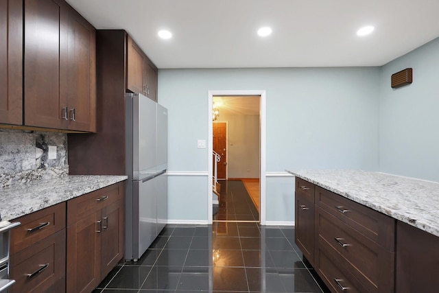 9043 Oriole Ave, Morton Grove, IL 60053 - empty room with wood finished floors and baseboards