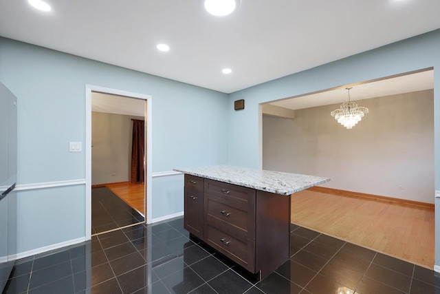 9043 Oriole Ave, Morton Grove, IL 60053 - unfurnished living room featuring a chandelier, wood finished floors, and stairs